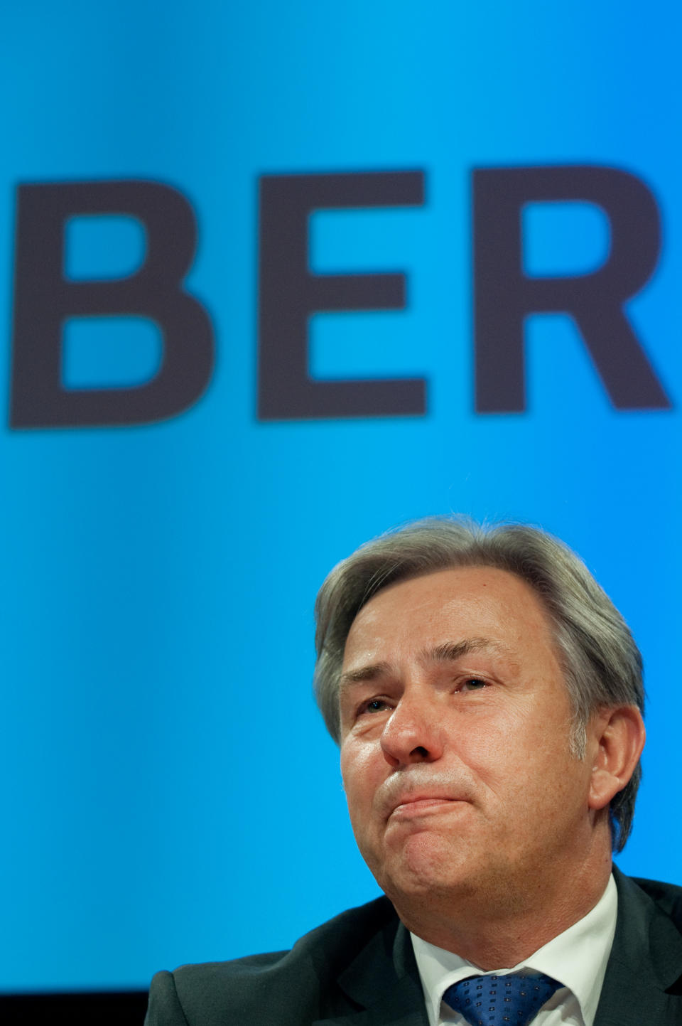 FILE - In this May 8, 2012 file picture the mayor of Berlin, Klaus Wowereit, attends a press conference at Berlin Schoenefeld airport. The opening of Berlin's new airport may be postponed for a fourth time - the latest delay in a project that has turned into a major embarrassment for German officials. The Willy Brandt airport was originally slated to open in 2011. After two delays last year, it was supposed to open on Oct. 27, 2013. But Transport Ministry spokesman Sebastian Rudolph said Monday Jan. 7, 2013 that officials were told last week airport managers see new "major" problems. He didn't elaborate. Germany's Bild newspaper, citing internal documents, reported that the airport won't be able to open before 2014 at the earliest. (AP Photo/dapd/ Klaus-Dietmar Gabbert,File)