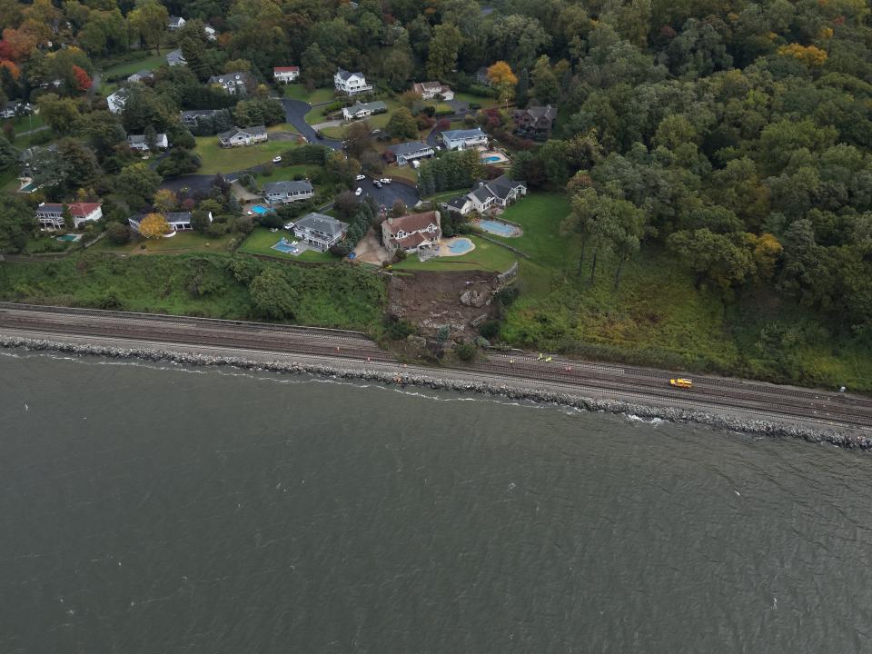 A mudslide obstructed all four Metro-North Railroad tracks near Scarborough station in the village of Briarcliff Manor Saturday.