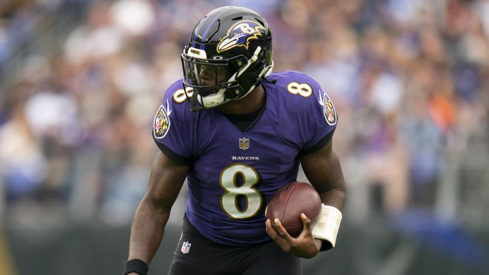 Baltimore Ravens quarterback Lamar Jackson runs with the ball during the second half against the Cleveland Browns.