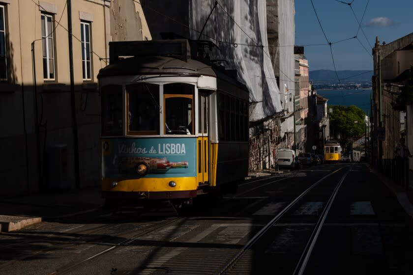 Two trams are seen going up the hill from downtown Lisbon to Graca. April 25th. Lisbon, Portugal. Jose Sarmento Matos for the La Times.