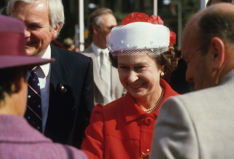 <p>Wearing red and white, the colors of Canada's flag, the Queen returned to the country in 1984 to mark 200 years of settlement in New Brunswick and Ontario.</p>