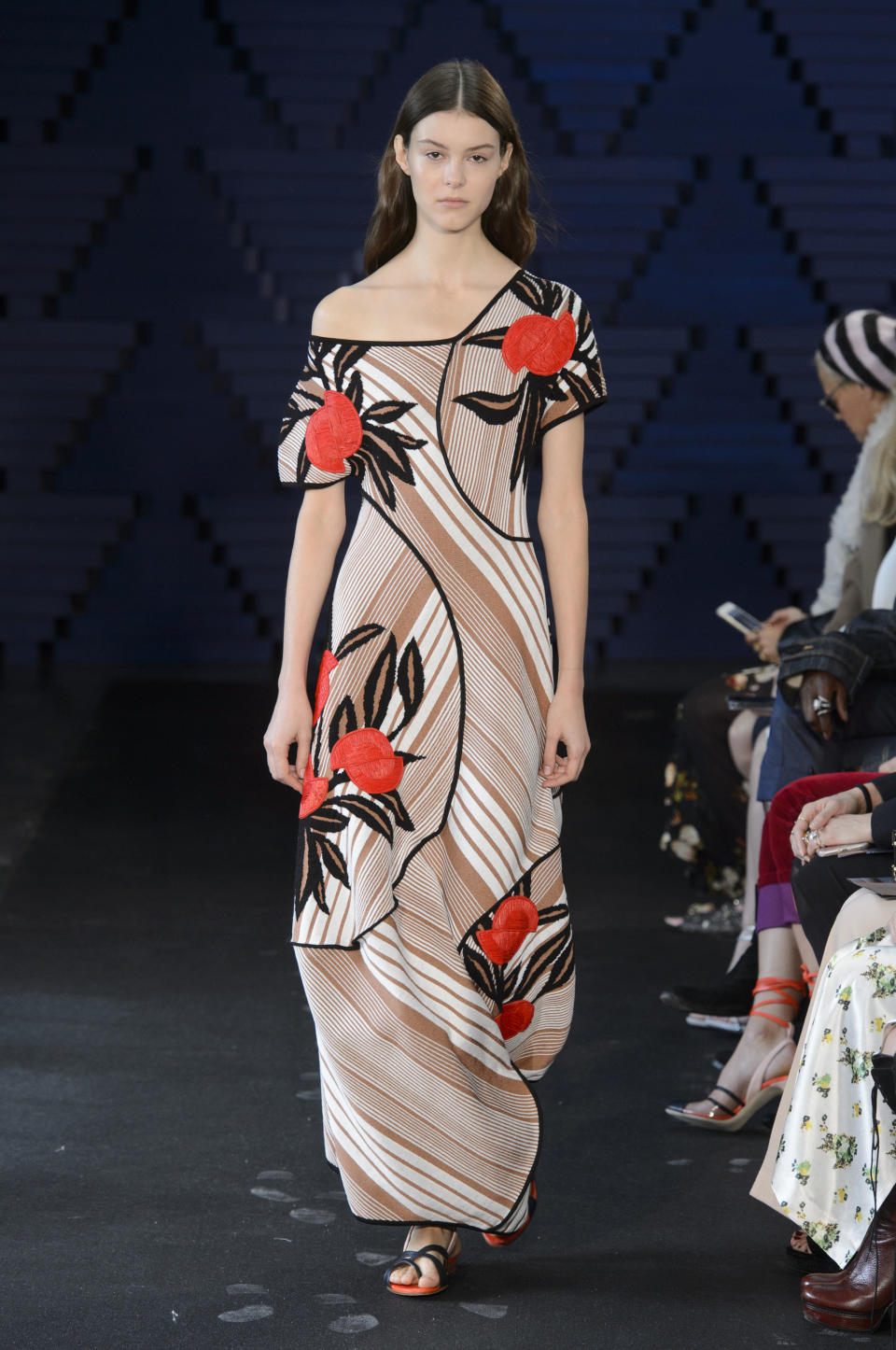 <p><i>Light-brown striped dress with red floral accents from the SS18 collection. (Photo: IMAXtree) </i></p>