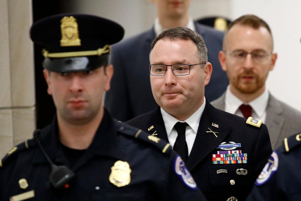 Army Lt. Col. Alexander Vindman departs a closed door meeting on Capitol Hill on Oct. 29, 2019.