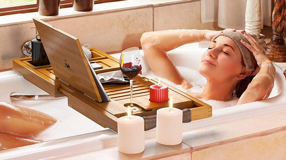 Best gifts for book lovers: Utoplike Bamboo Bathtub Caddy Tray Bath Tray