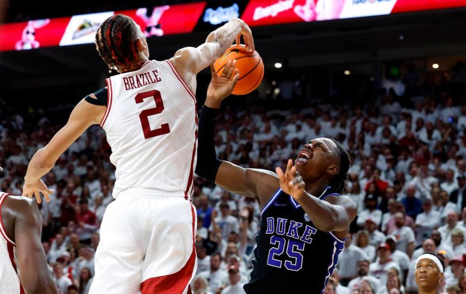 Arkansas’ Trevon Brazile (2) blocks the shot by Duke’s Mark Mitchell (25) during the second half of Arkansas’ 80-75 victory over Duke at Bud Walton Arena in Fayetteville, Ark., Weds. Nov. 29, 2023.