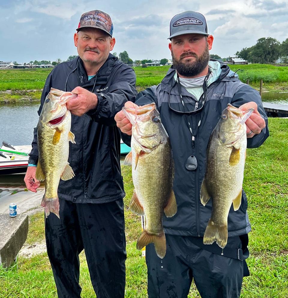 Larry Walls, left, and Clayton Walls caught these bass on Day Two to help them to a total weight of 26.10 pounds to win the Bass Bandits of Brandon tournament June 25-26 on Lake Kissimmee. 