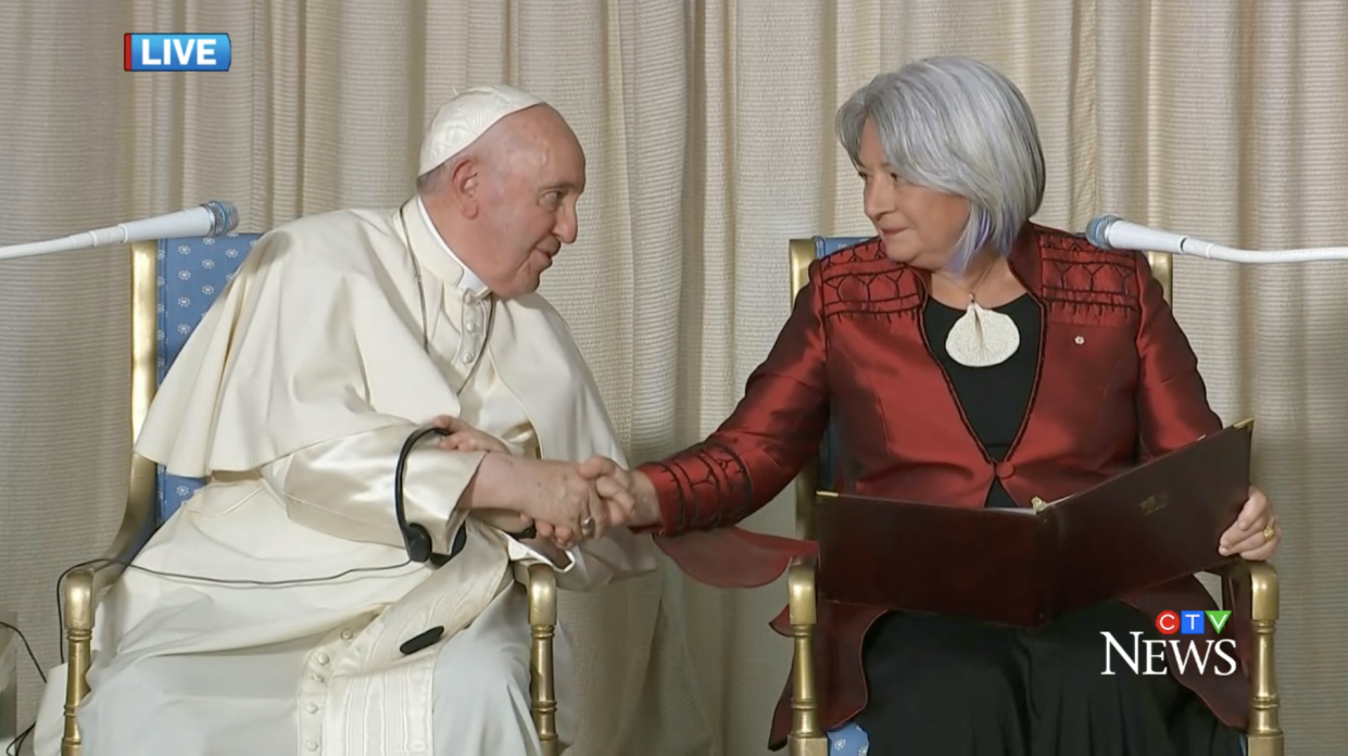 The Pope shakes Governor General Mary Simon's hand after her public address in Québec City, Québec on Wednesday. (Screenshot of CTV News)