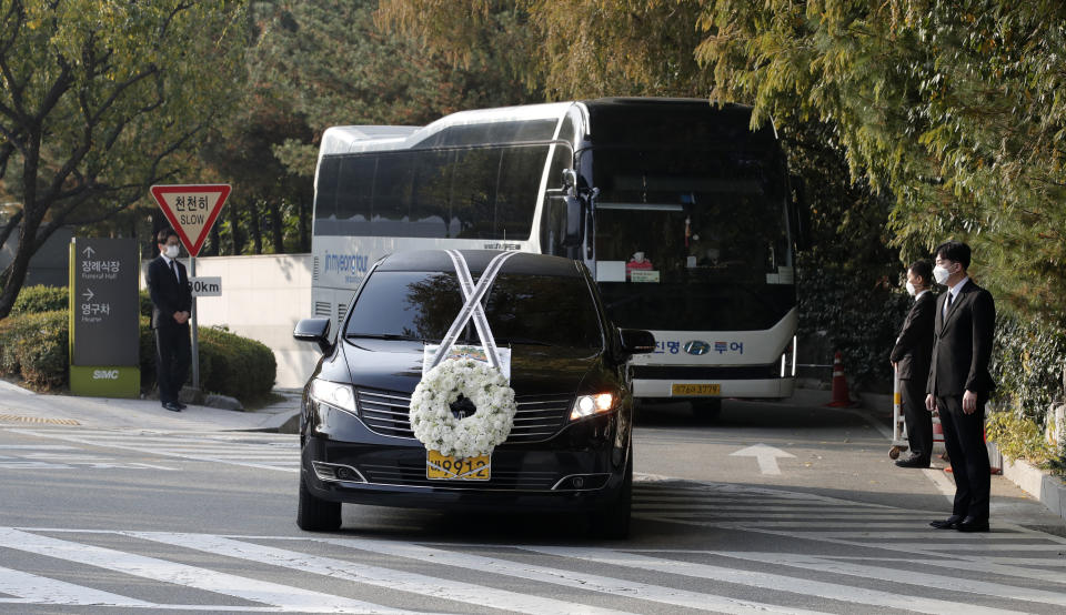 A hearse of the late Samsung Electronics Chairman Lee Kun-Hee leaves outside a funeral hall in Seoul, South Korea, Wednesday, Oct. 28, 2020. As Samsung Electronics mourns the death of its long-time chairman, Lee Kun-Hee, questions loom over what's next for South Korea's biggest company. Samsung has struggled for years to diversify from its core hardware business to tap new technologies and services.(AP Photo/Lee Jin-man)