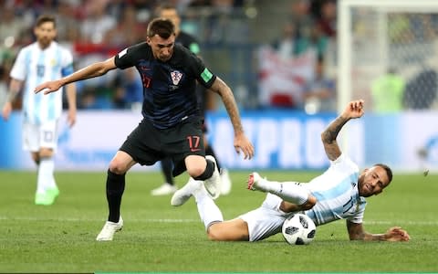 Otamendi tackles Mario Mandzukic, without connecting with the ball - Credit: Gabriel Rossi/Getty Images