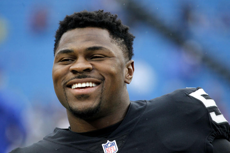 FILE - In this Oct. 29, 2017, file photo, Oakland Raiders defensive end Khalil Mack smiles before an NFL football game against the Buffalo Bills in Orchard Park, N.Y. The Chicago Bears have acquired star pass rusher Khalil Mack from the Raiders on Saturday, Sept. 1, 2018, in a massive trade that sends two first-round draft picks to Oakland. A person with direct knowledge of the trade told The Associated Press that Oakland will get first-round selections in 2019 and 2020, a sixth-rounder next year and a third-rounder in 2020. Oakland also included its second-round selection in 2020. The person spoke on condition of anonymity because the trade had not been announced. (AP Photo/Jeffrey T. Barnes, File)