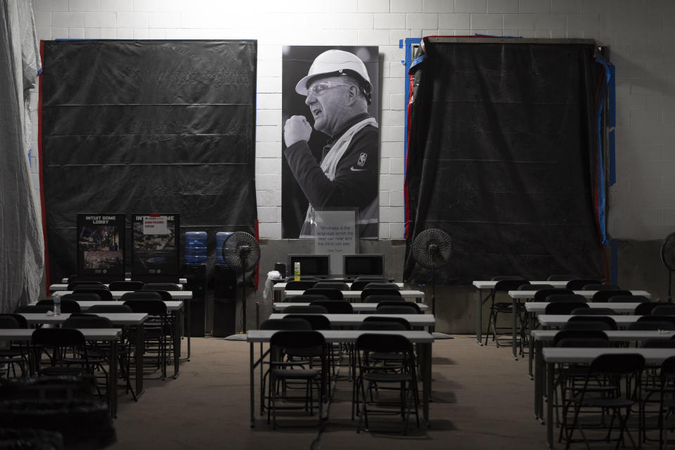 A photo of Los Angeles Clippers owner Steve Ballmer hangs inside the construction site of the team's Intuit Dome in Inglewood, Calif., Thursday, June 22, 2023. The arena is expected to be completed in time for the 2024-25 NBA season. (AP Photo/Jae C. Hong)