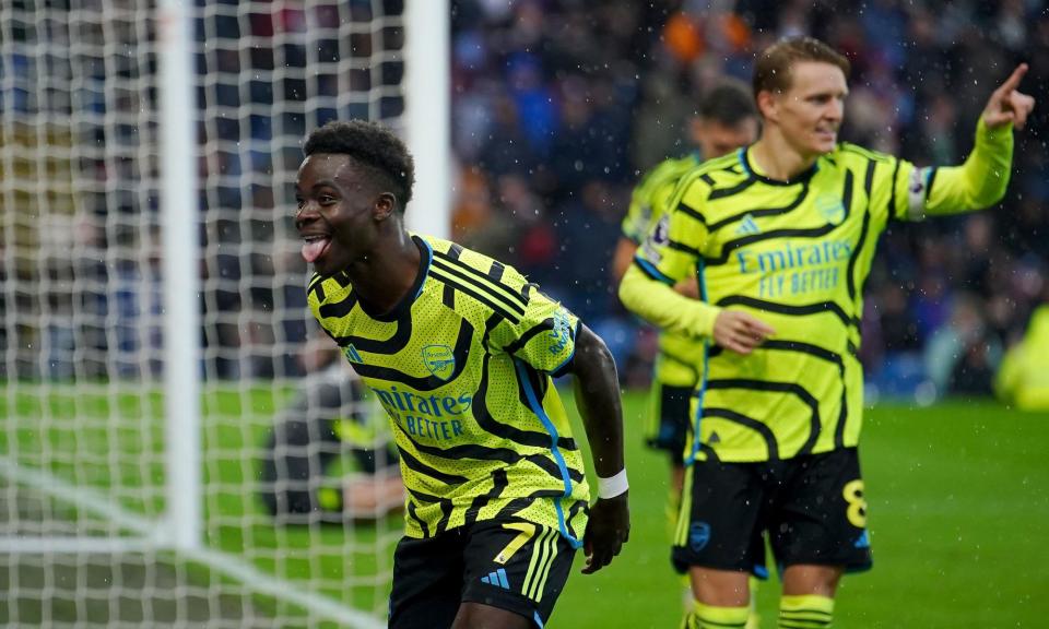 <span>Bukayo Saka celebrates scoring Arsenal’s third goal in their thrashing of Burnley.</span><span>Photograph: Peter Byrne/PA</span>