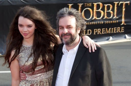 Director Peter Jackson (R) and his daughter Katie arrive for the world premiere of "The Hobbit" movie in Wellington on November 28. The loudest cheers from the crowds were for Jackson, who has been credited with turning the New Zealand film industry into a multi-billion dollar success