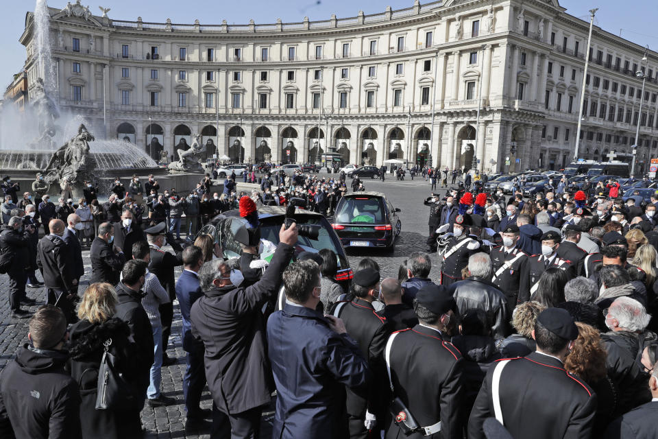 The caskets of Italian ambassador to Democratic Republic of Congo Luca Attanasio and Italian Carabinieri police officer Vittorio Iacovacci are driven away at the end of their funeral, in Rome, Thursday, Feb. 25, 2021. Italy paid tribute Thursday to its ambassador to Congo and his bodyguard who were killed in an attack on a U.N. convoy, honoring them with a state funeral and prayers for peace in Congo and all nations "torn by war and violence." (AP Photo/Andrew Medichini)