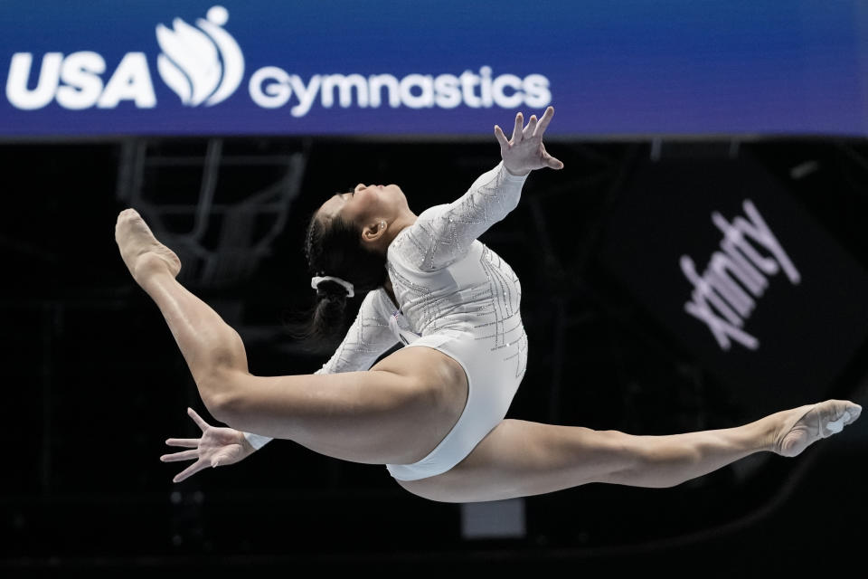 FILE - Sunisa Lee competes on the balance beam during the U.S. Gymnastics Championships Sunday, Aug. 27, 2023, in San Jose, Calif. Health is obviously a huge matter considering the reigning Olympic all-around champion endures a kidney-related issue that halted her college career after her sophomore season last year at Auburn – and is rebounding from the emotional lows that followed. “I’m doing really good,” Lee said after Friday morning’s, Feb. 23, 2024, workout for Saturday’s USA Gymnastics Winter Cup. (AP Photo/Godofredo A. Vásquez, FIle)