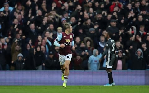 Jack Grealish jogs back to the halfway line after making it 2-1 - Credit: Reuters