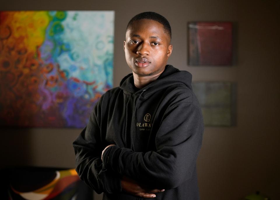 May 2, 2022; Westerville, Ohio, USA; Lansana Gottor poses at Olawale Law Firm in Westerville. 

Gottor is a permanent resident from Sierra Leone who lost his green card because he voted in the 2016 election, not knowing that green card holders can't vote.

His attorney Emmanuel Olawale recently requested prosecutorial discretion under Biden'ss new immigration enforcement priorities but the request was denied. Gottor faces deportation.

Mandatory Credit: Barbara J. Perenic/Columbus Dispatch