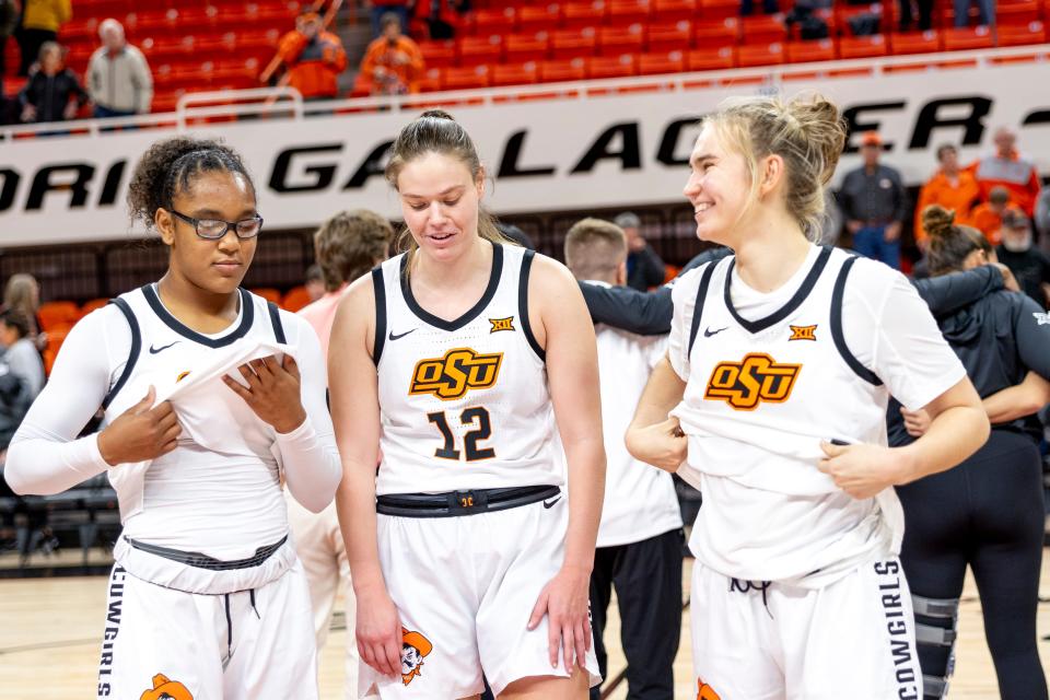 (L-R) Oklahoma State 's Stailee Heard, Lior Garzon and Anna Gret Asi celebrate together after a womenÕs college basketball game against Oklahoma Christian Tuesday, Oct. 31, 2023, in Stillwater, Okla. (Mitch Alcala for the Oklahoman)