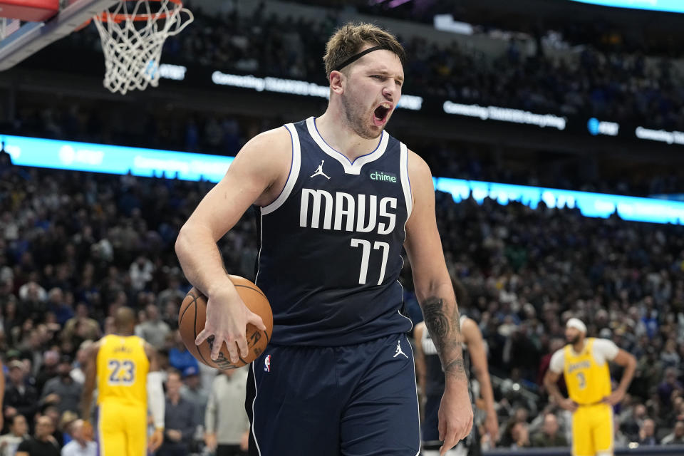 Dallas Mavericks guard Luka Doncic reacts to a call during the second half of an NBA basketball game against the Los Angeles Lakers in Dallas, Tuesday, Dec. 12, 2023. (AP Photo/LM Otero)