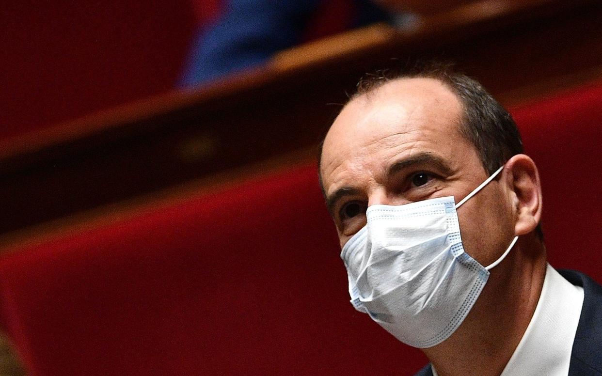 Prime Minister Jean Castex wearing a face mask attends a session of questions to the Government at the French National Assembly in Paris on July 8 - AFP