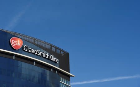 FILE PHOTO: Signage for GlaxoSmithKline is seen on it's offices in London, Britain, March 30, 2016. REUTERS/Toby Melville