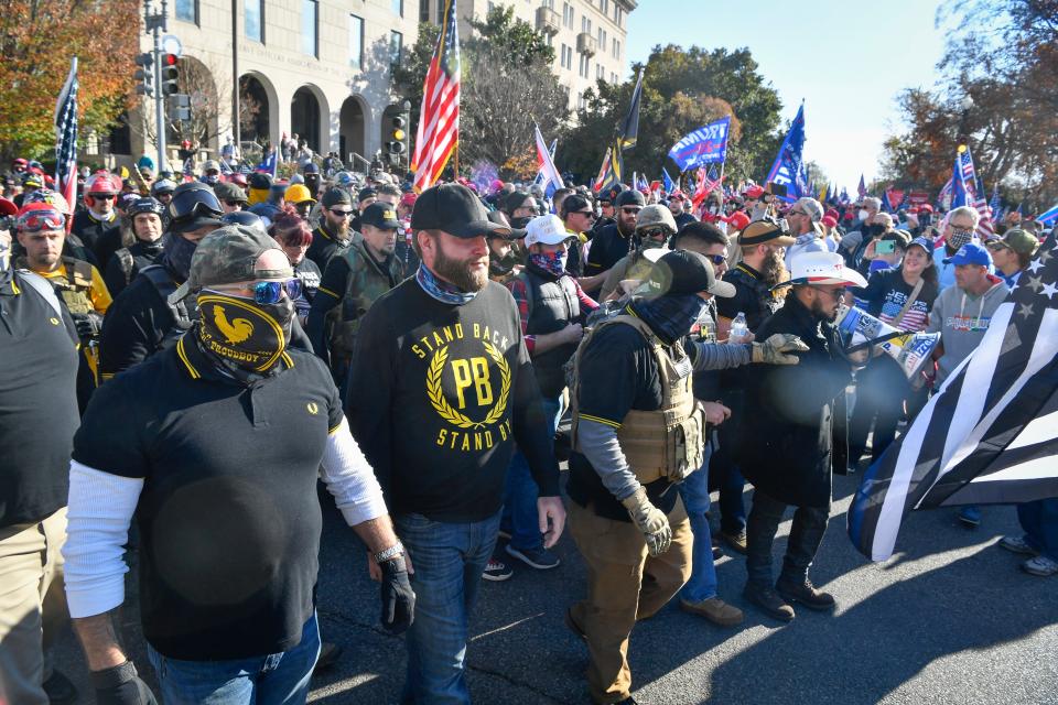 Members of the Proud Boys demonstrate with other supporters of President Donald Trump near the Supreme Court during the Million MAGA March on Nov 14, 2020.