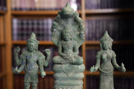 Some of the Cambodian antiquities recovered by the United States Attorney's Office are displayed during a news conference in New York, Monday, Aug. 8, 2022. Officials announced the repatriation of 30 antiquities to Cambodia that had been illegally trafficked. (AP Photo/Seth Wenig)