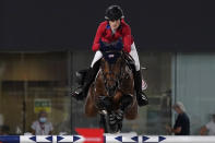 United States' Jessica Springsteen, riding Don Juan van de Donkhoeve, competes during the equestrian jumping individual qualifying at Equestrian Park in Tokyo at the 2020 Summer Olympics, Tuesday, Aug. 3, 2021, in Tokyo, Japan. (AP Photo/Carolyn Kaster)