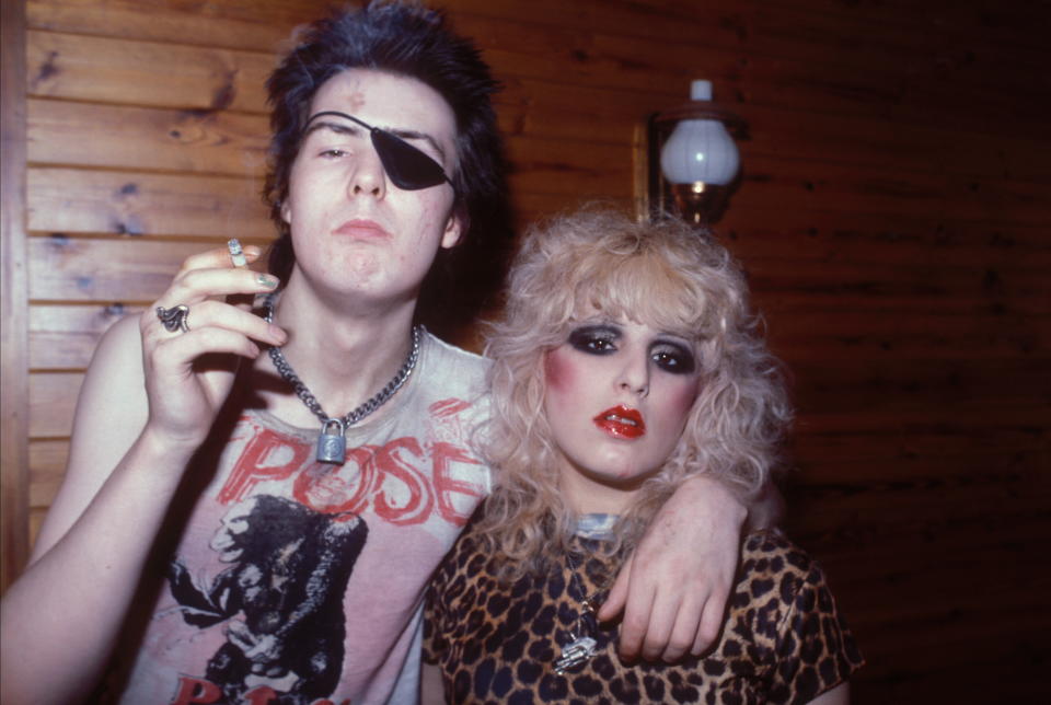 Sid Vicious of the Sex Pistols, wearing an eye patch, with Nancy Spungen, 1978. (Watal Asanuma/Shinko Music/Getty Images)