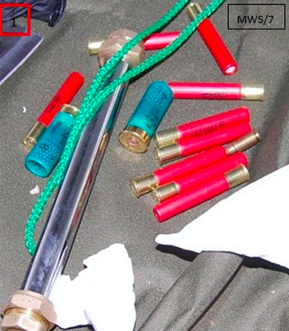 <em>Shotgun cartridges and a partially constructed pipe bomb that was found stashed in Naweed Ali’s car (PA)</em>