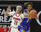 Pittsburgh's Sandrine Clesca (0) pulls the rebound from North Carolina State's Jakia Brown-Turner (11) during the first half of an NCAA college basketball game, Thursday, Feb. 25, 2021 in Raleigh, N.C. (Ethan Hyman/The News & Observer via AP, Pool)