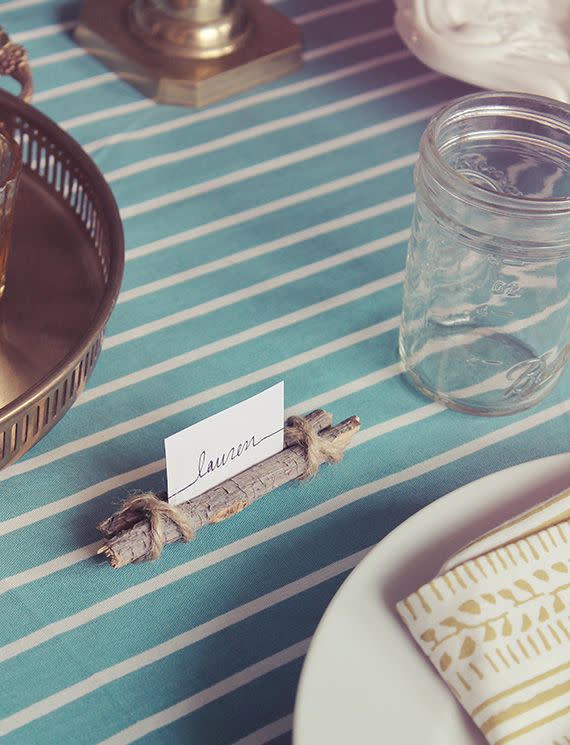 <p>For a rustic look, put together these simple place cards with the help of twigs, twine, and hot glue. </p><p><strong><em><a href="https://almostmakesperfect.com/diy-twig-and-twine-place-cards/" rel="nofollow noopener" target="_blank" data-ylk="slk:Get the tutorial at Almost Makes Perfect;elm:context_link;itc:0;sec:content-canvas" class="link ">Get the tutorial at Almost Makes Perfect</a>.</em></strong></p><p><a class="link " href="https://www.amazon.com/KINGLAKE-Natural-Christmas-Gardening-Applications/dp/B00WHXQIJA?tag=syn-yahoo-20&ascsubtag=%5Bartid%7C10070.g.2668%5Bsrc%7Cyahoo-us" rel="nofollow noopener" target="_blank" data-ylk="slk:SHOP TWINE;elm:context_link;itc:0;sec:content-canvas">SHOP TWINE</a></p>
