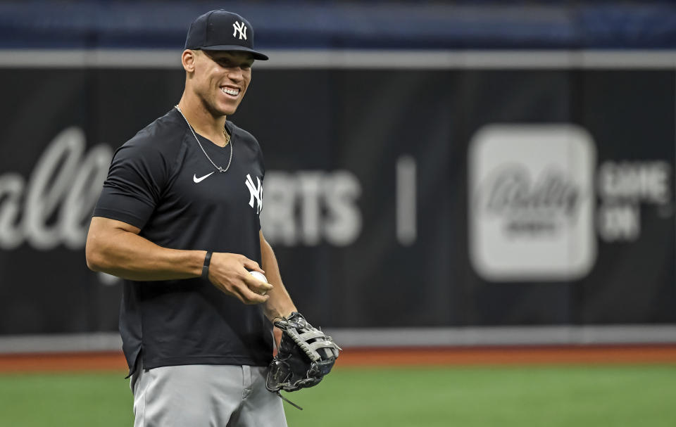 New York Yankees outfielder Aaron Judge, in his return from the COVID-19 injured list, loosens up before a baseball game against the Tampa Bay Rays, Tuesday, July 27, 2021, in St. Petersburg, Fla. (AP Photo/Steve Nesius)