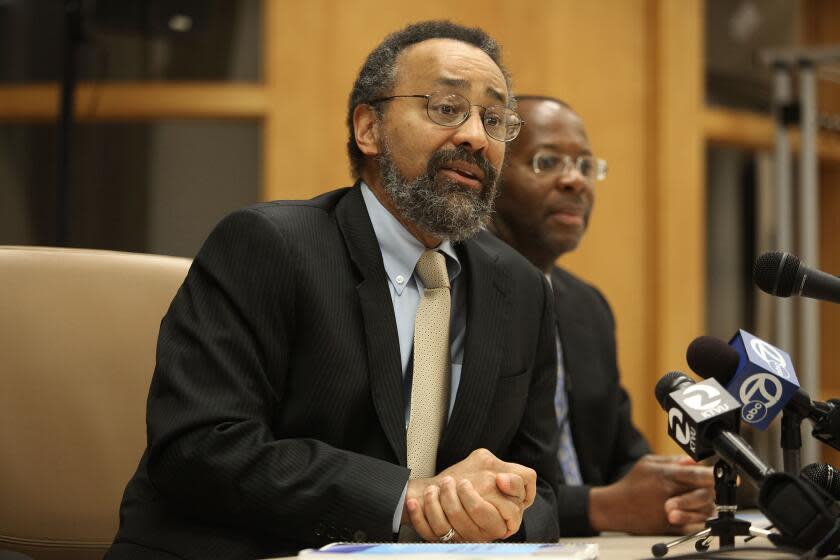 Dean and professor at the UC Berkeley School of Law Christopher F. Edley, Jr., (left) and vice president of the University of California Charles F. Robinson (back) answer questions on their report of an examination of police protocols and policies in responding to future UC protests and acts of civil disobedience at University of California offices in Oakland, Calif., on Friday, May 4, 2012. (Photo By Liz Hafalia/The San Francisco Chronicle via Getty Images)