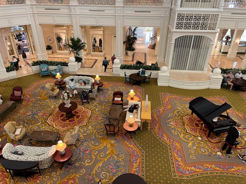 overhead shot of the lobby at the grand floridian from the second floor of the resort