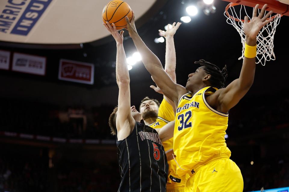 Michigan center Tarris Reed Jr. blocks the shot of Wisconsin's Tyler Wahl during the second half of U-M's 64-59 loss on Tuesday, Feb. 14, 2023, in Madison, Wisconsin.