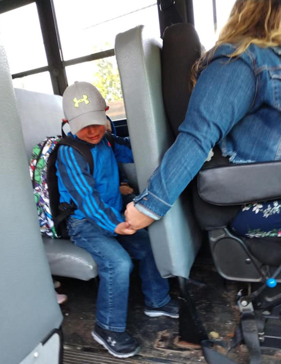 Bus driver comforts boy on first day of kindergarten 