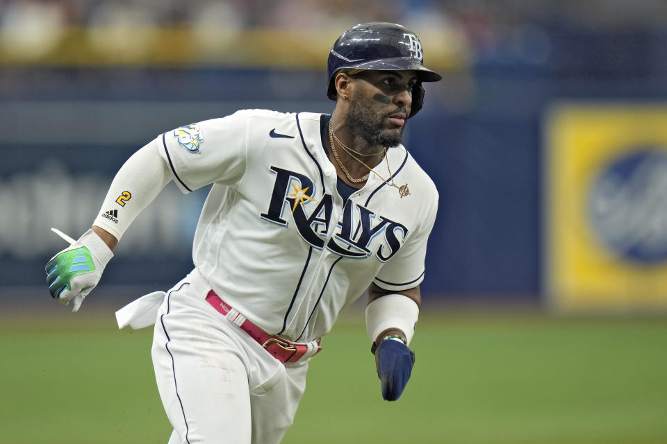 Tampa Bay Rays' Yandy Diaz reacts home to score on an RBI double by Isaac Paredes off Los Angeles Angels starting pitcher Griffin Canning during the first inning of a baseball game Thursday, Sept. 21, 2023, in St. Petersburg, Fla. (AP Photo/Chris O'Meara)