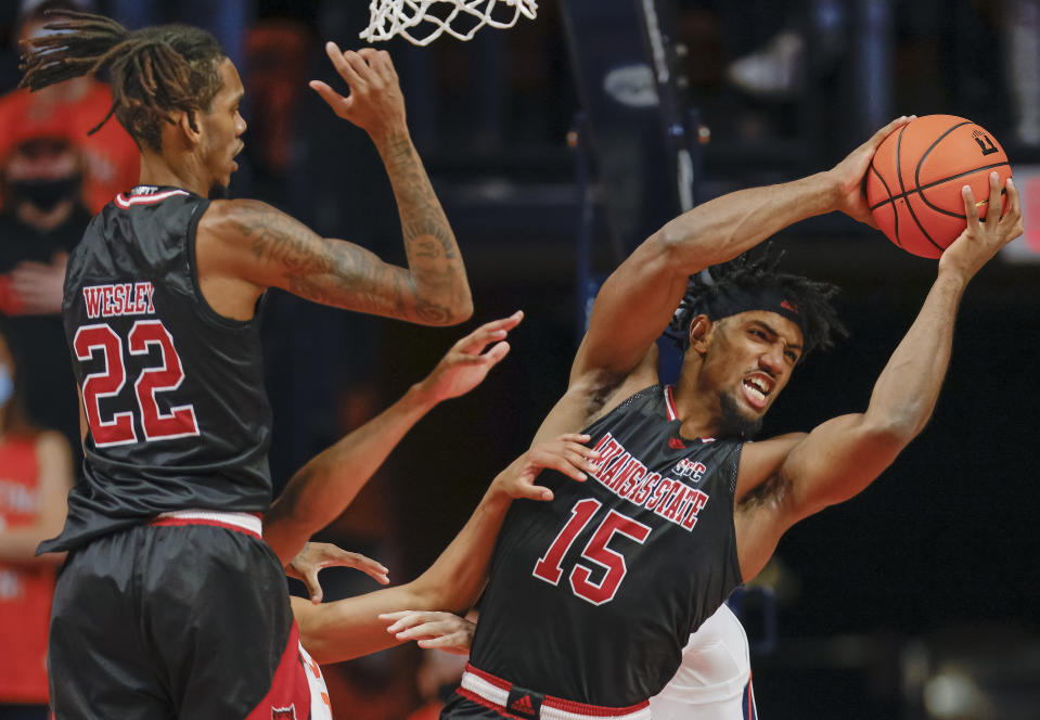 CHAMPAIGN, IL - NOVEMBER 12: Norchad Omier #15 of the Arkansas State Red Wolves grabs a rebound during the first half against the Illinois Fighting Illini at State Farm Center on November 12, 2021 in Champaign, Illinois. (Photo by Michael Hickey/Getty Images)