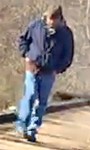 PHOTO: This Feb. 13, 2017, file photo released by the Indiana State Police shows a man walking along the trail system in Delphi, Ind., authorities say is the suspect in the killings of two teenage girls. (Indiana State Police via AP, FILE)