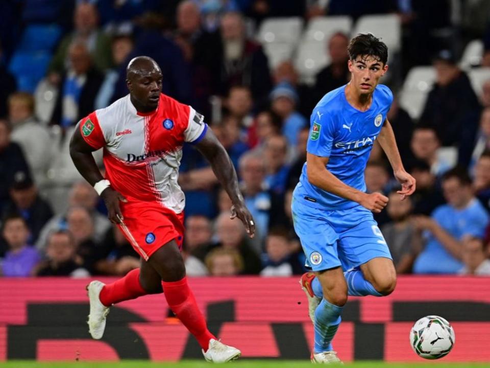 Akinfenwa started in Wycombe’s defeat by Manchester City (AFP via Getty Images)