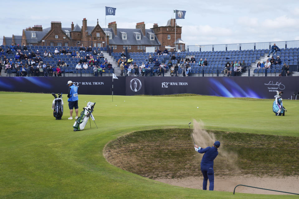 Sam Horsfield of England plays from a bunker on the 17th hole during a practice round ahead of the British Open Golf Championships at Royal Troon golf club in Troon, Scotland, Tuesday, July 16, 2024. (AP Photo/Jon Super)