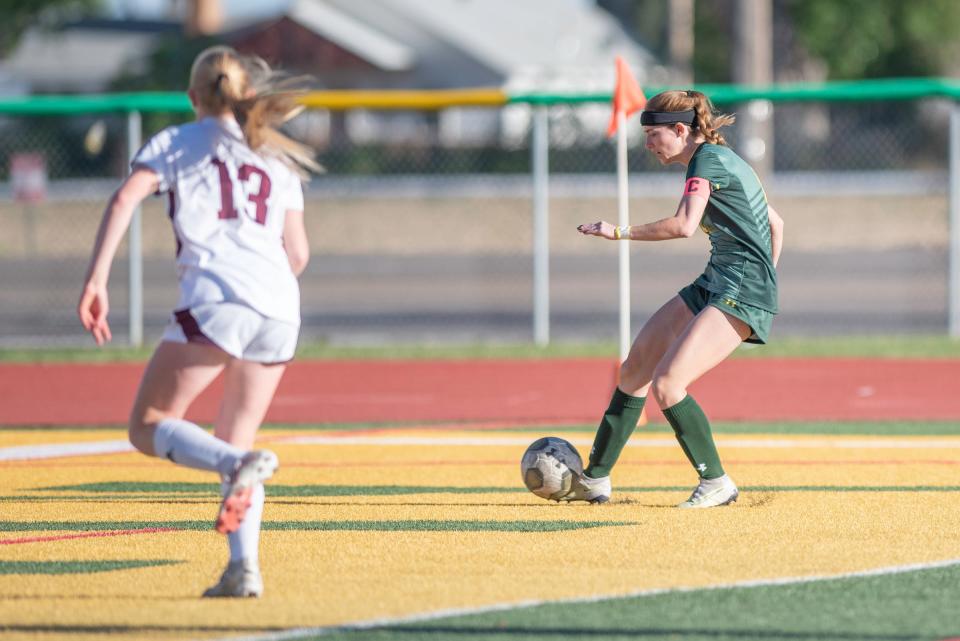 Pueblo County's Pierson Weimer fires off a shot for a goal against Cheyenne Mountain during the first round of the CHSAA girls soccer state championship tournament on Wednesday, May 8, 2024.