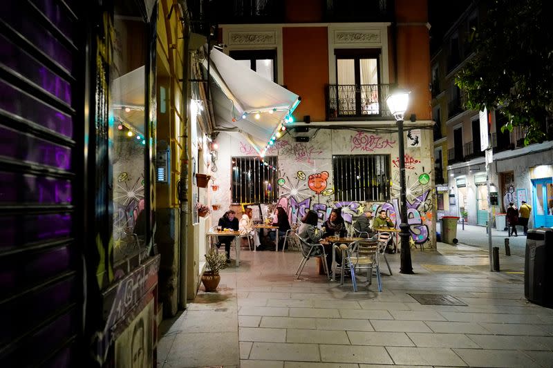 People sit on a terrace amid the coronavirus disease (COVID-19) pandemic in Madrid