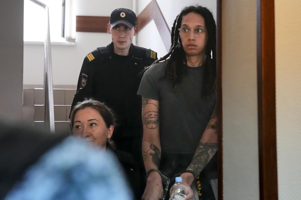 Brittney Griner is escorted to a Moscow courtroom for a hearing on Monday.