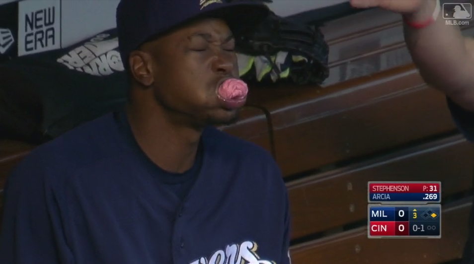 Keon Broxton valiantly attempts to chew all the gum in the Brewers dugout. (MLB.com)