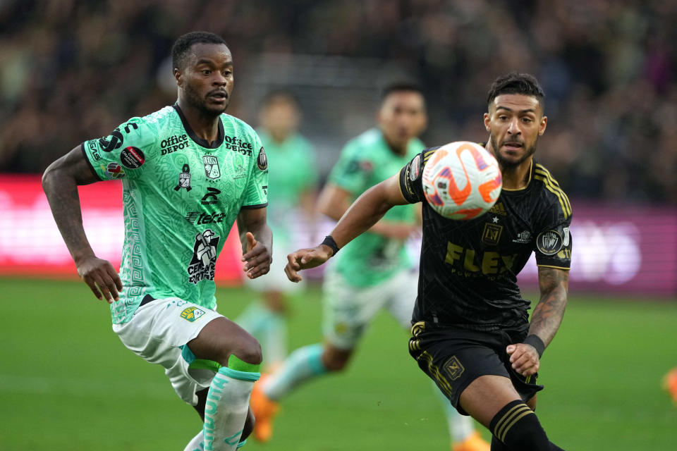 LAFC's Denis Bouanga (right) and Club León's Jaine Barreiro battle for the ball during the second leg of the Concacaf Champions League final at BMO Stadium. Club León won the final to earn a spot in the Club World Cup.