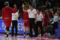 Japan's coach Toru Onzuka gestures to his players as they leave the court following their loss to Australia at the women's Basketball World Cup in Sydney, Australia, Tuesday, Sept. 27, 2022. (AP Photo/Mark Baker)