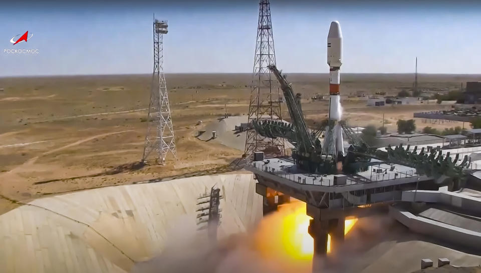 In this handout photo taken from video released by Roscosmos on Tuesday, Aug. 9, 2022, a Russian Soyuz rocket lifts off to carry Iranian Khayyam satellite into orbit at the Russian leased Baikonur cosmodrome near Baikonur, Kazakhstan. A Russian rocket has successfully launched an Iranian satellite into orbit. The Soyuz rocket lifted off as scheduled at 8:52 a.m. Moscow time (0552 GMT) Tuesday from the Russia-leased Baikonur launch facility in Kazakhstan. (Roscosmos via AP)