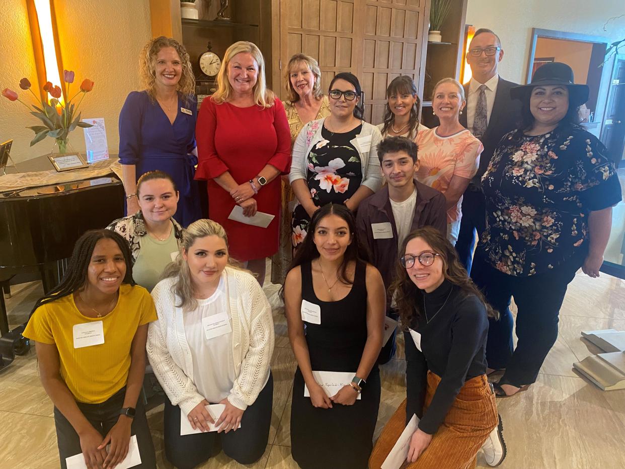 Recipients of grants and scholarships pose with members of the Rancho Mirage Woman's Club on April 28, 2022.